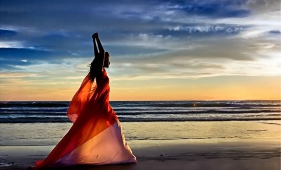 Woman walking on beach